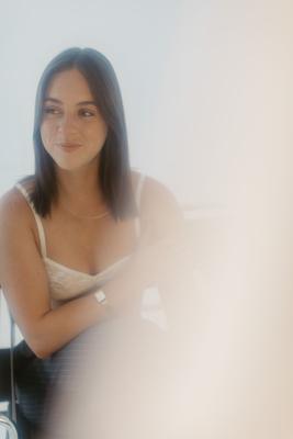 Soft focus portrait in the wire chair
