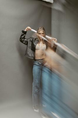 Leather jacket in motion, editorial boudoir frame