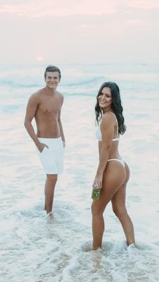 Couple in the surf, beach session Newcastle